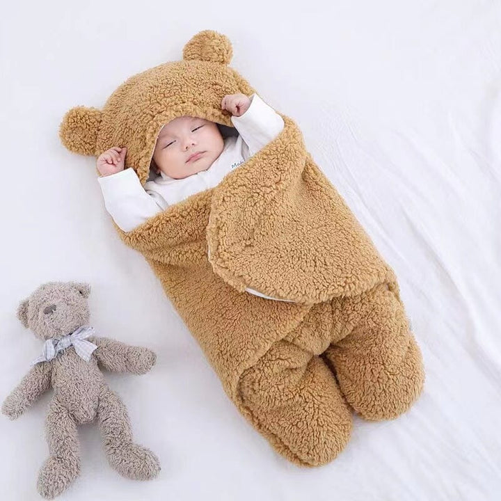 Soft bear ear swaddle blanket, essential newborn gear for cold weather