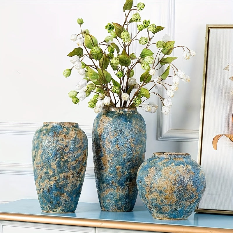 Unique vintage handmade ceramic vase in blue earthenware finish
