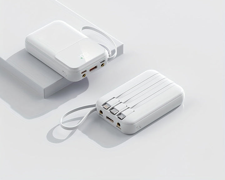 Modern 10000mAh power bank with built-in cables, ensuring fast charging anywhere, anytime.