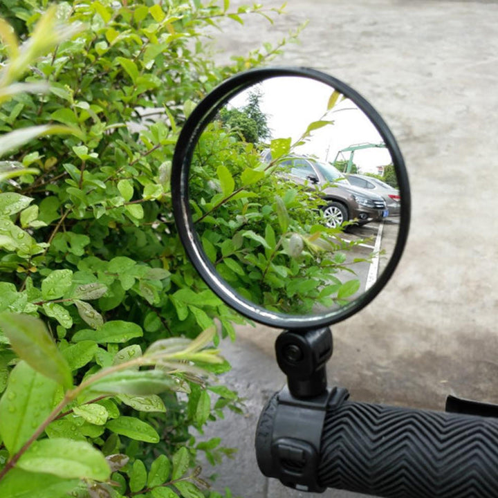 Unisex 360° rotating bicycle rearview mirror, enhancing cycling safety & visibility for all bikes.