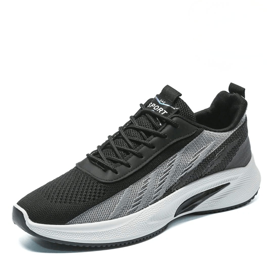 Unisex active lace-up sports shoes with a visible cushioned sole, perfect for athletic activities and everyday comfort.
