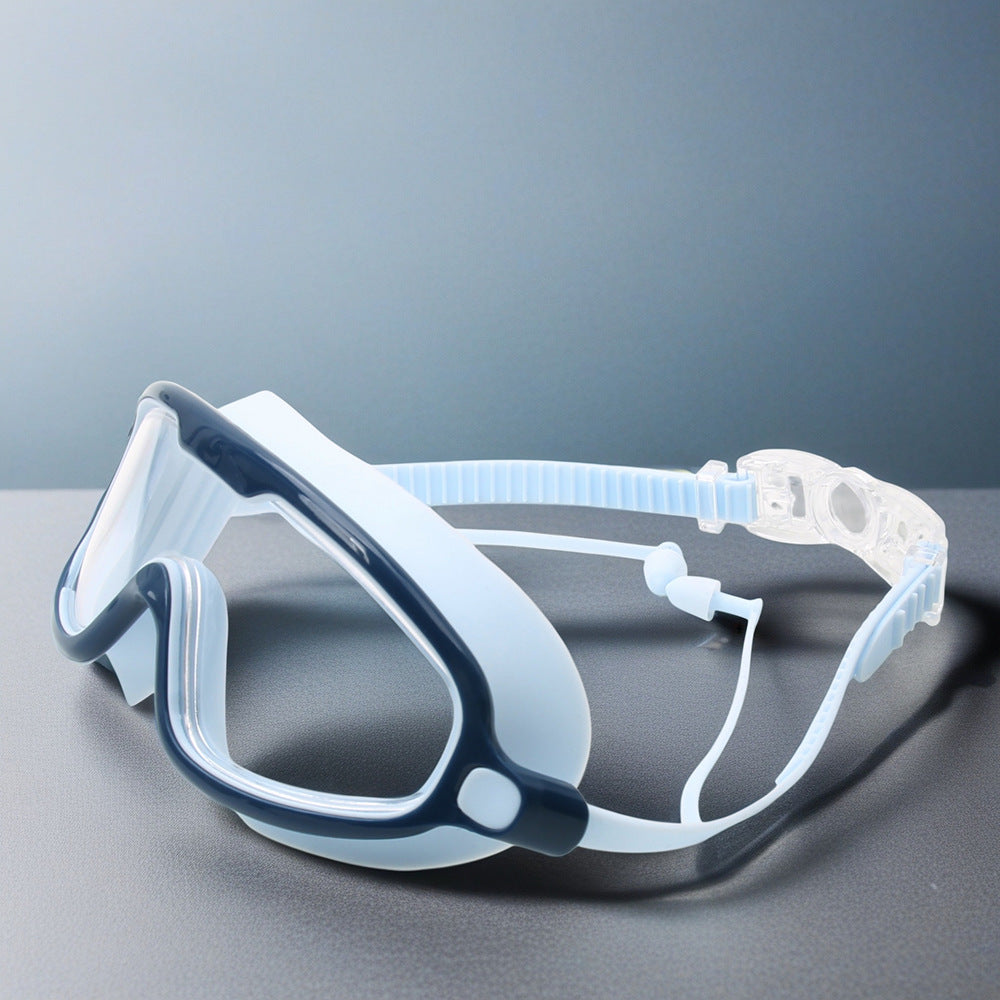 Snorkeling gear: adjustable swim mask for adults, ensuring clear views during water sports.