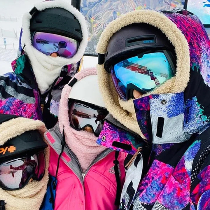 Skier wearing a warm, windproof ArcticShield 3-in-1 winter hat, perfect for cold weather skiing & outdoor sports.
