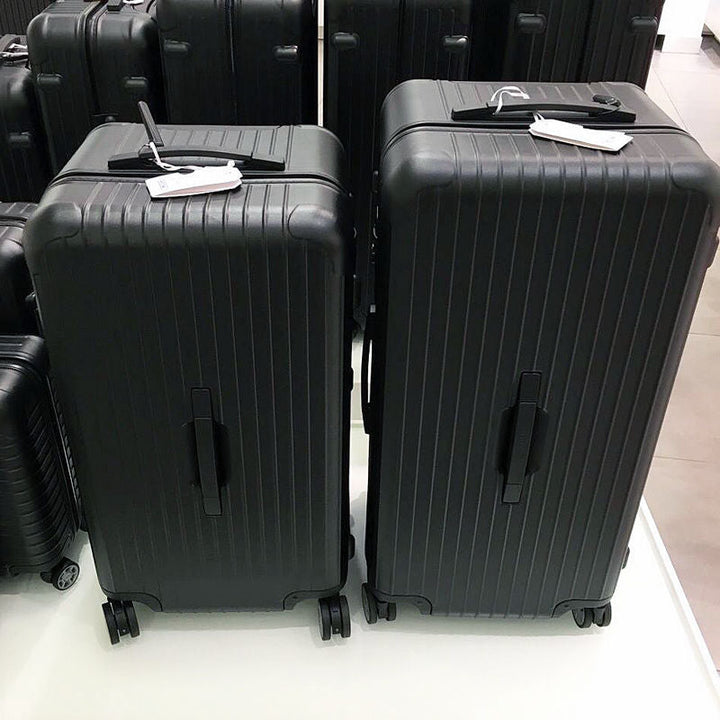 Durable hardshell travel suitcase with secure lock, ideal for vacation gear & adventure.