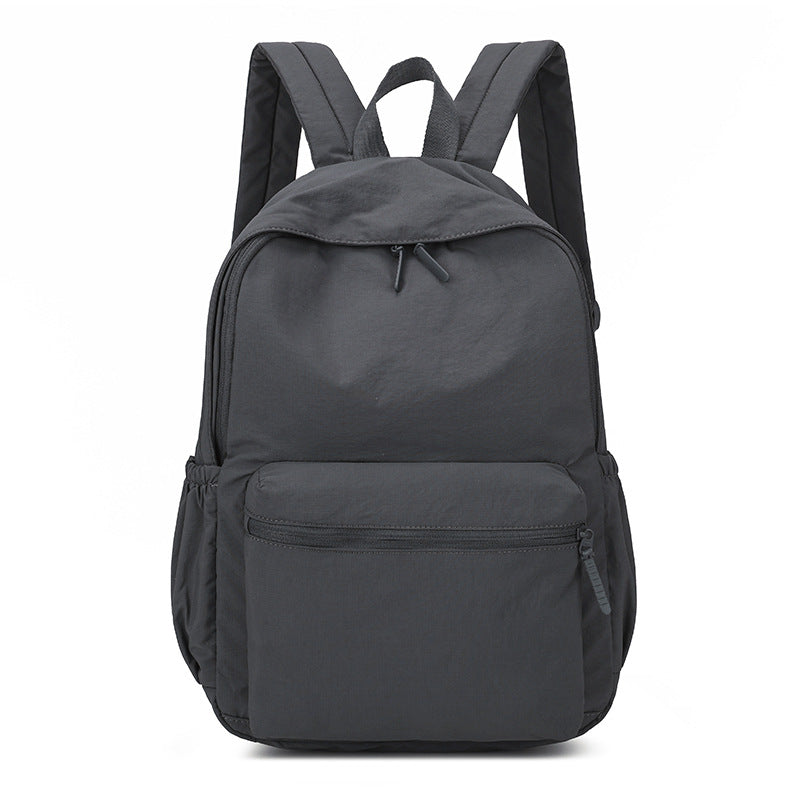 Durable & water-resistant unisex adventure backpack, perfect as a commuter bag & daily travel companion.