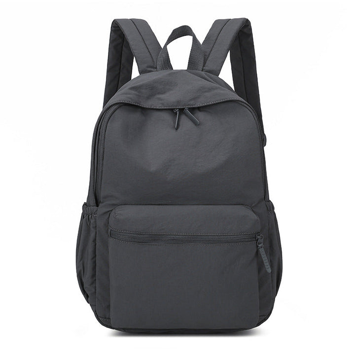 Durable & water-resistant unisex adventure backpack, perfect as a commuter bag & daily travel companion.