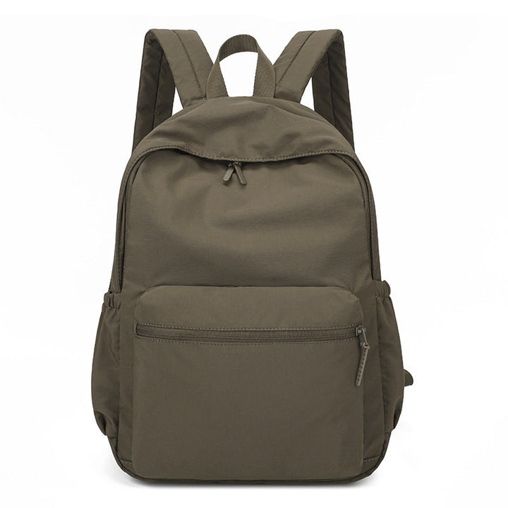 Large capacity unisex casual backpack, ideal for daily essentials, school, work & light travel.