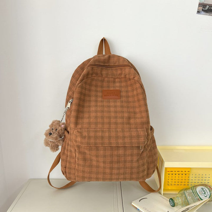 Modern checkered design backpack, versatile for unisex students & daily fashion. Durable casual travel bag.