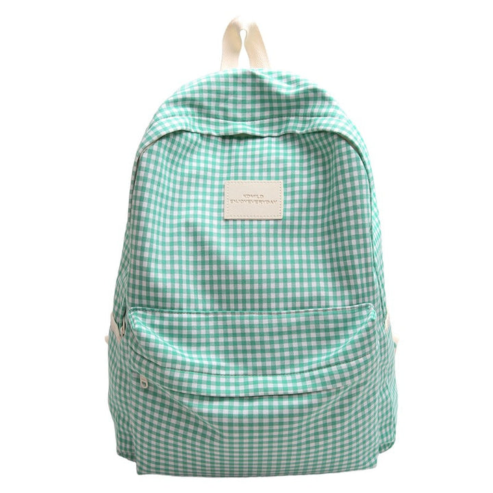 Casual unisex checked canvas daypack, ideal for school, travel, & daily adventures. Stylish & practical.
