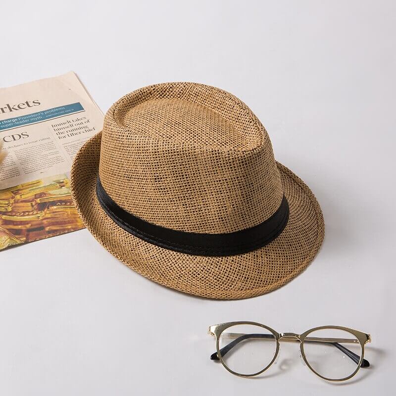 Stylish beach trilby hat, lightweight and unisex, offering sun protection for seaside fun & vacations.