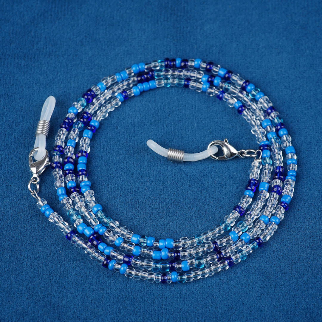 Colorful beaded eyewear chain, shown protecting stylish eyeglasses from drops.