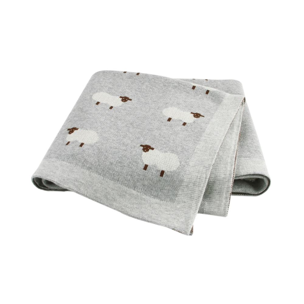 Essential unisex baby shower gift: a cozy, soft cotton knit swaddle blanket.