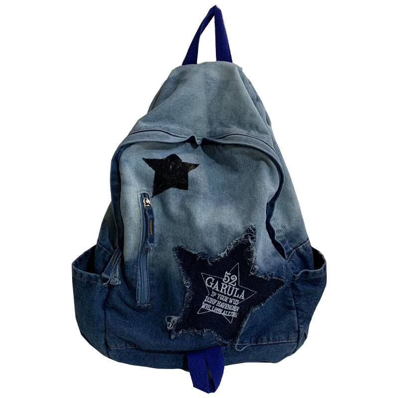 Unisex denim backpack with star appliqué, perfect for school or casual everyday carry. Durable student essential.