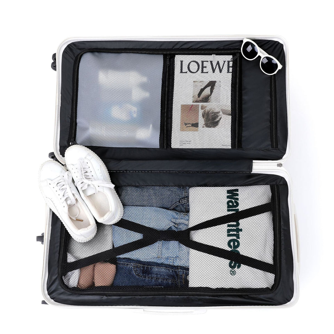 Organized unisex suitcase for vacation, featuring durable shell & handy drink holder.