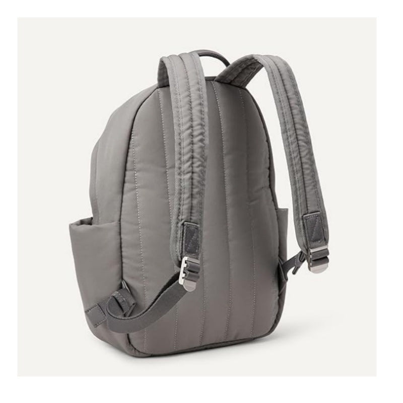 Open unisex ergonomic backpack revealing versatile internal storage for laptop and daily essentials. Durable & spacious.