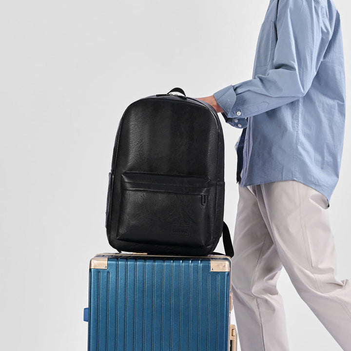 Unisex executive leather backpack for business travel & professional carry. Durable and stylish.