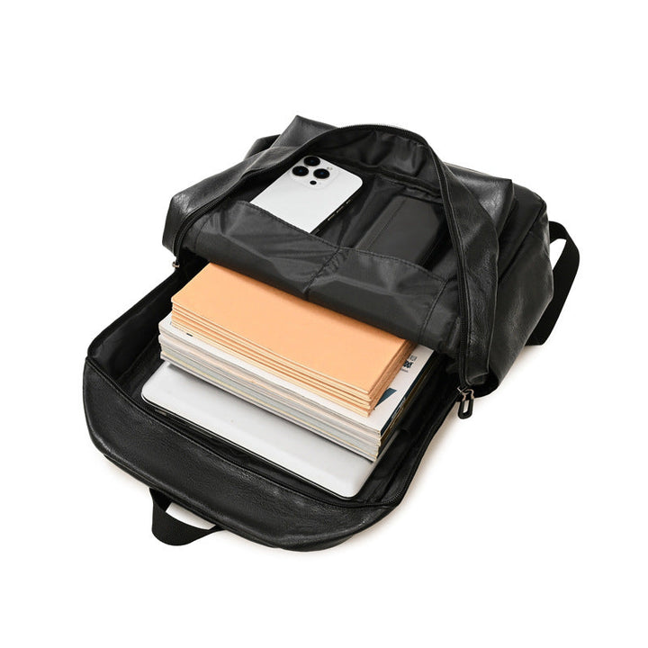 Unisex leather laptop backpack with organized storage for work essentials. Ideal for daily commute.