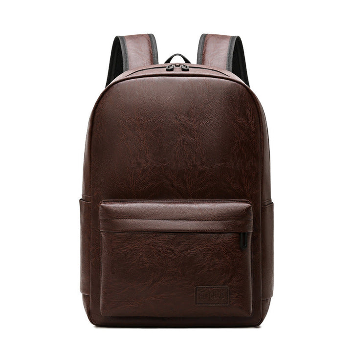Professional leather travel backpack, durable and spacious for business trips. Unisex design.