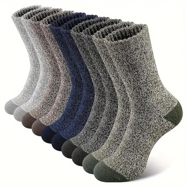 Unisex extra thick merino wool socks, ideal for winter comfort & warmth. Insulating & breathable footwear.