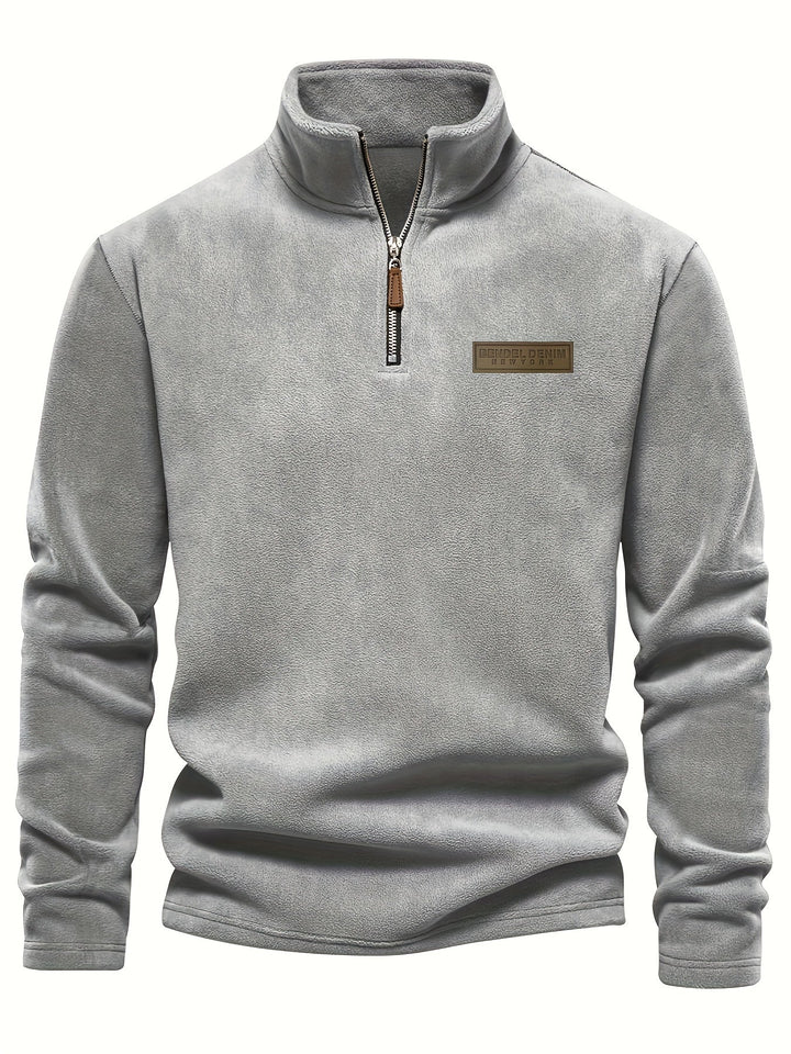 Unisex fleece-lined half-zip pullover, perfect for cold weather layering and warmth.