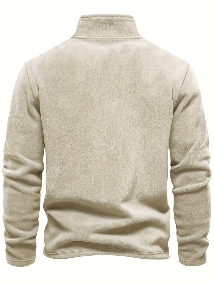 Stylish unisex half-zip pullover, with a protective collar and cozy fleece lining for winter.