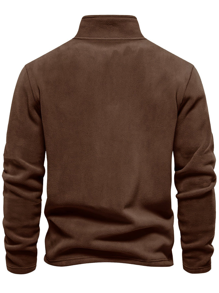 Snug & warm unisex half-zip pullover, fleece-lined for maximum comfort during cold fall/winter days.