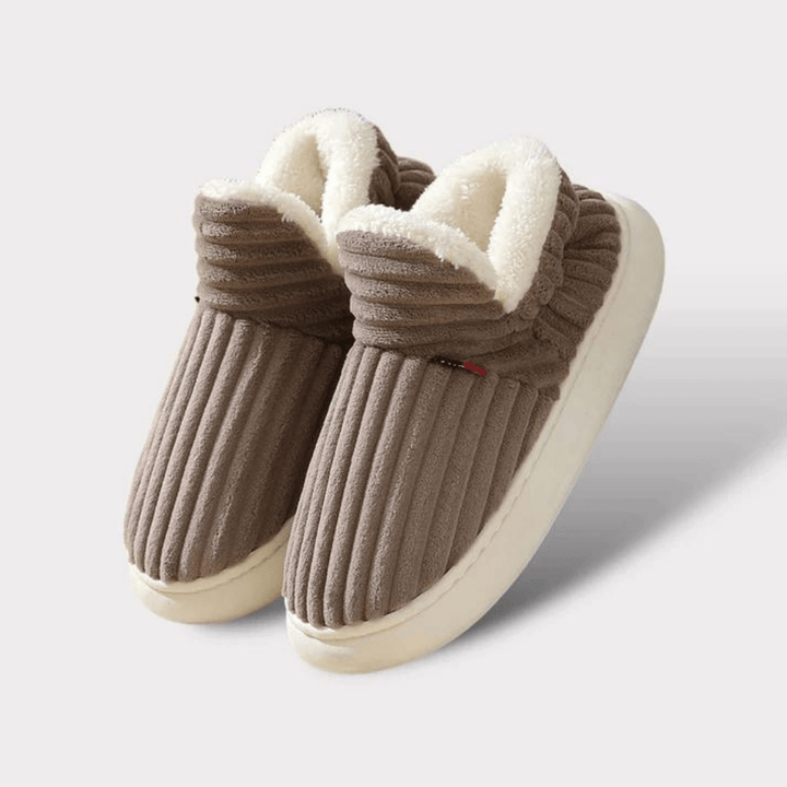 Fleece-lined casual wear slippers, perfect for relaxing at home.
