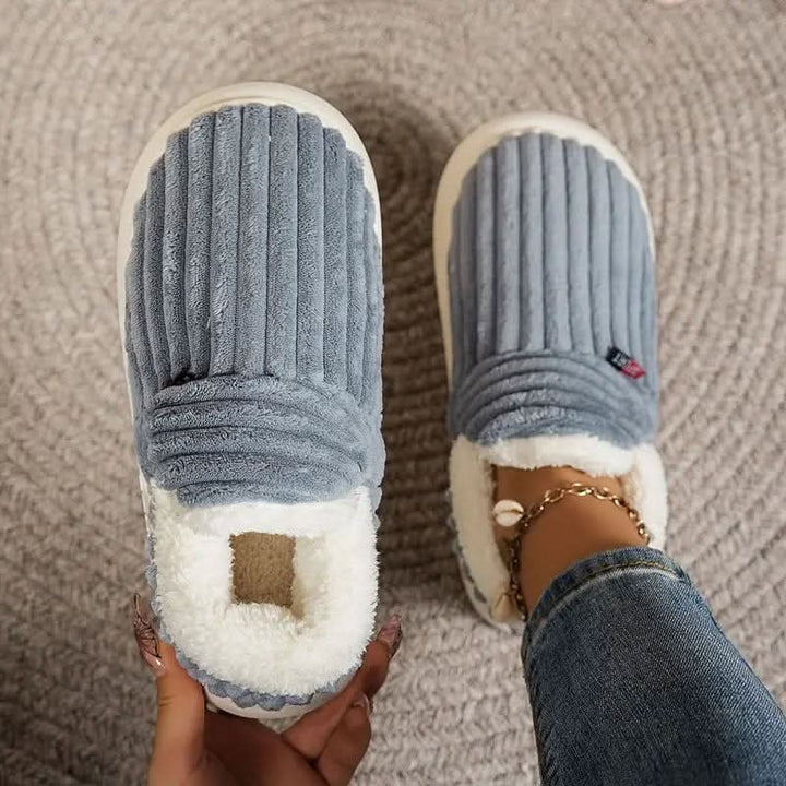 Plush fleece interior makes these house slippers incredibly cozy.