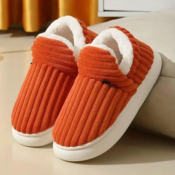 Essential unisex indoor shoes for cold weather comfort.