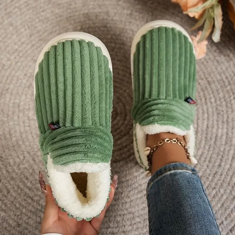 Cozy fleece-lined slippers, perfect for keeping feet warm indoors.