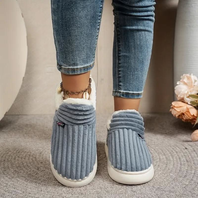Durable and comfortable fleece-lined slippers with a non-slip grip.