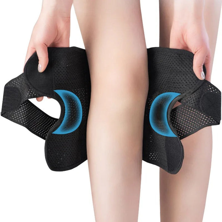 Black FlexGuard knee pads with springs & adjustable strap for secure, comfortable unisex knee support.