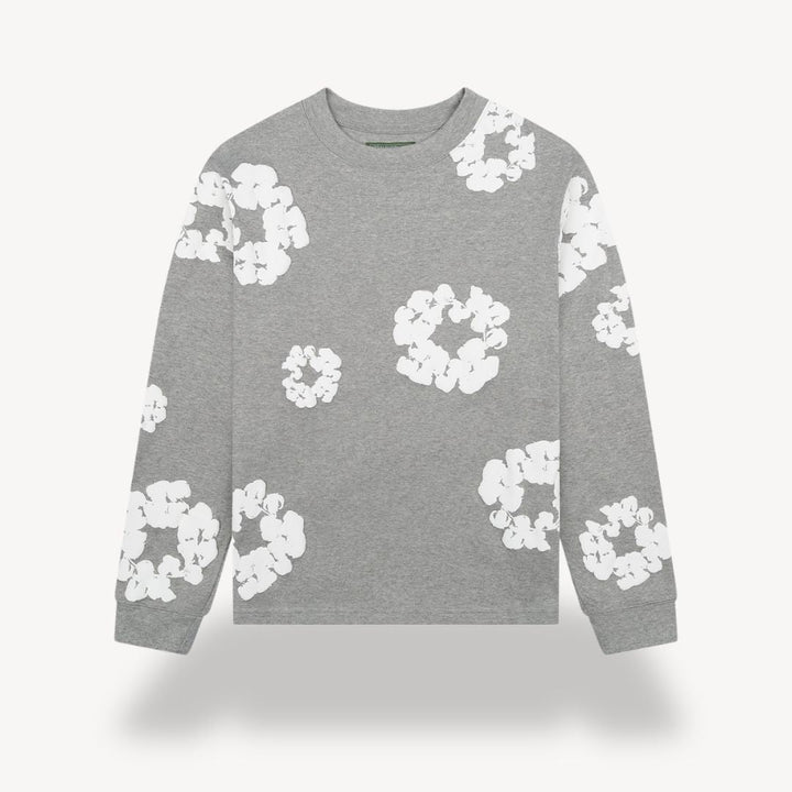 Cozy unisex floral print crew neck pullover. Soft, comfortable long sleeve sweatshirt for trendy autumn fashion.