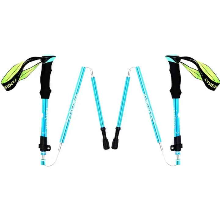 Hiker using an adjustable foldable aluminum trekking pole on a mountain trail.