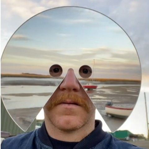 Stand out with this unisex mirror face mask, ideal for parties, festivals & unique costumes.