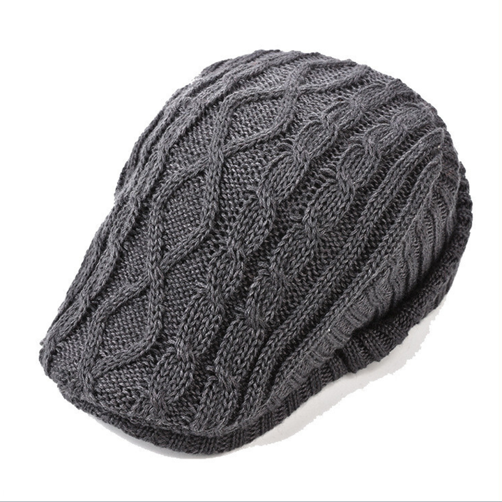 Stylish beige cable knit flat cap, a versatile unisex headwear accessory for cold weather.