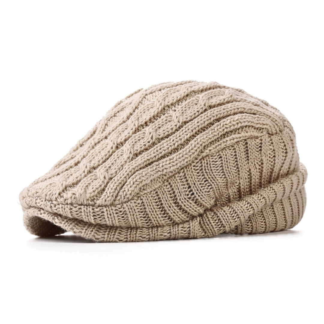 Black cable knit flat cap with a classic textured design. A comfortable unisex winter hat for everyday style.