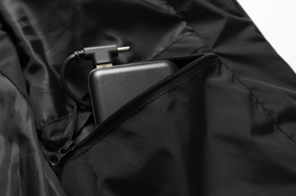 Embrace the cold with this high-performance unisex heated winter coat, engineered for comfort.