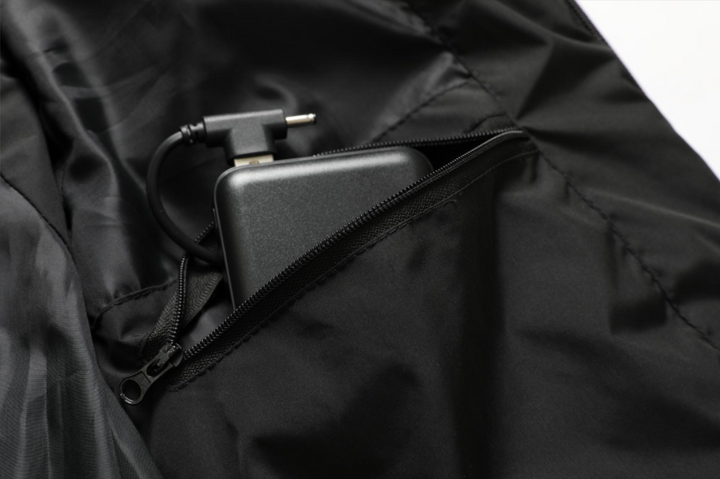 Embrace the cold with this high-performance unisex heated winter coat, engineered for comfort.