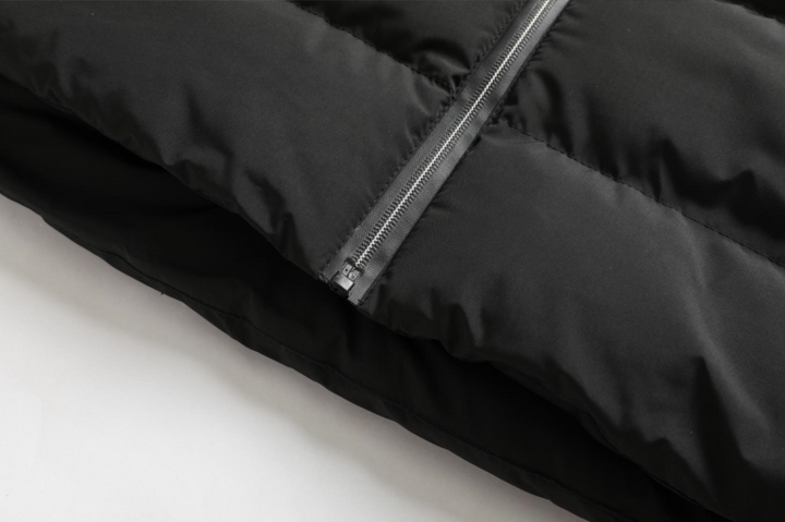 Unisex heated jacket designed for an active lifestyle, featuring adjustable heat & weather resistance.
