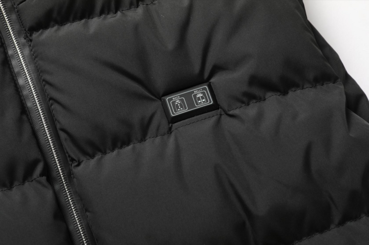 Durable unisex heated jacket, ideal for outdoor wear with its adjustable warmth & sleek design.