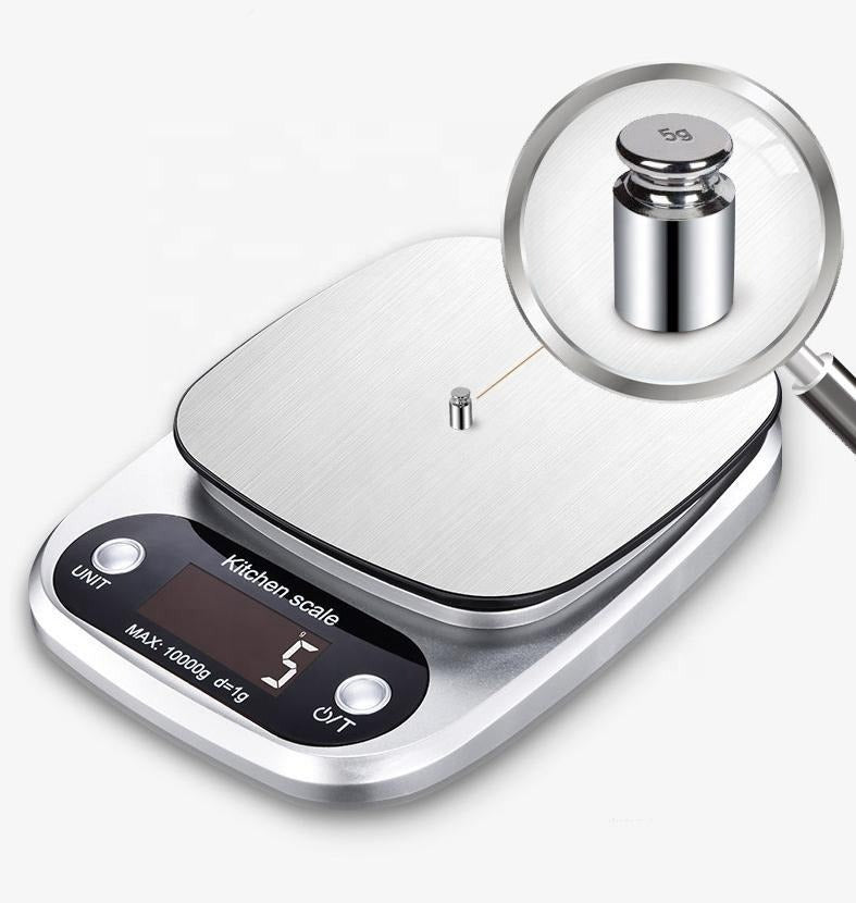 High precision digital baking scale for perfect results. Essential stainless steel kitchen tool for home chefs.
