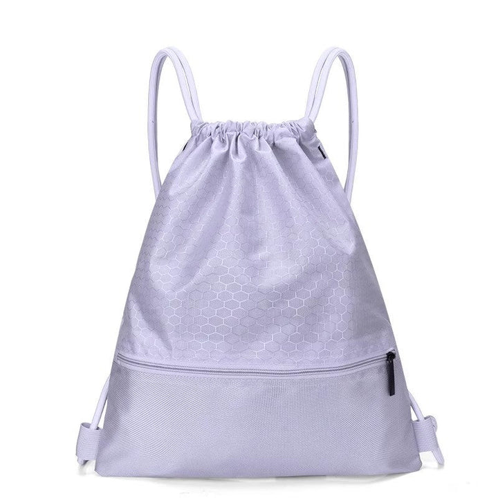 Close-up of honeycomb texture on unisex drawstring gym bag, highlighting durable, eco-friendly fabric.