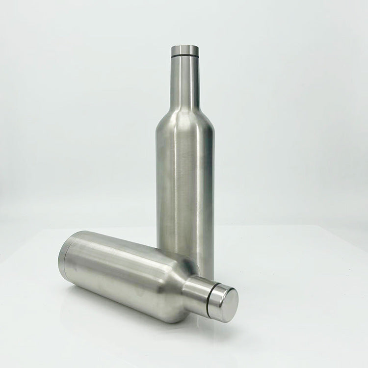 Durable unisex stainless steel travel bottle, insulated to keep drinks hot or cold. Reusable for daily hydration.