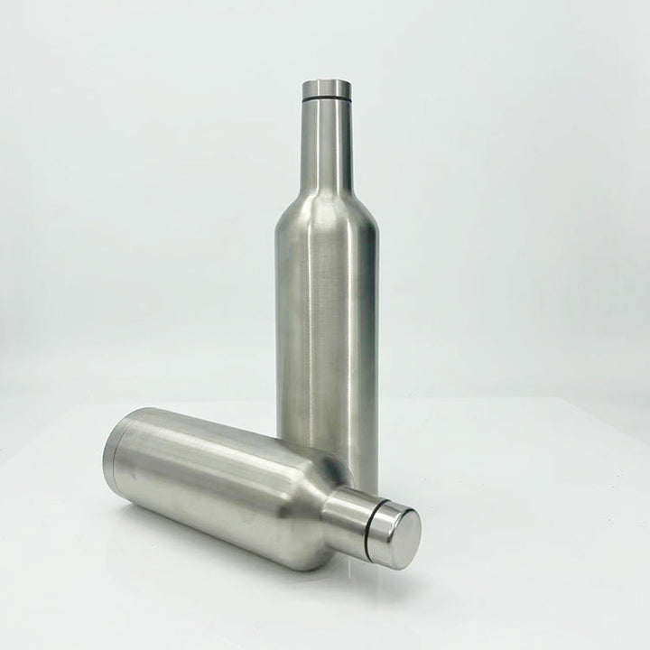 Durable unisex stainless steel travel bottle, insulated to keep drinks hot or cold. Reusable for daily hydration.