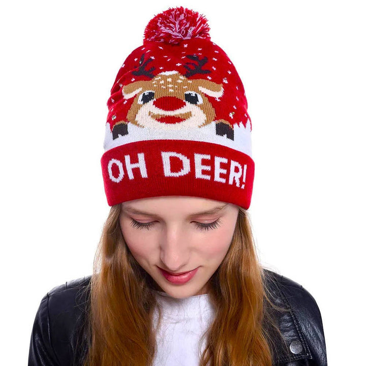 Light up unisex Christmas beanie, a festive LED knit hat with pompom for holiday parties.
