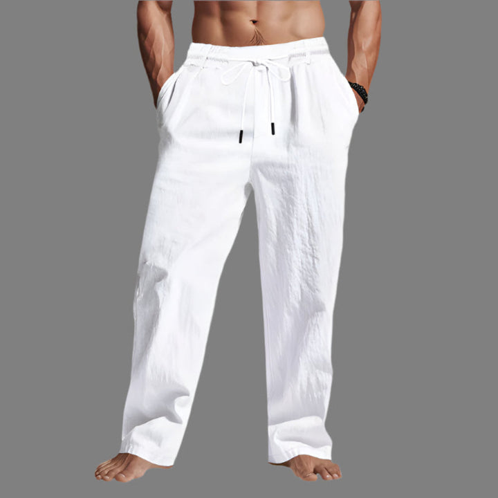 Relaxed fit linen drawstring pants, ideal for unisex summer fashion, vacation, & breathable comfort.