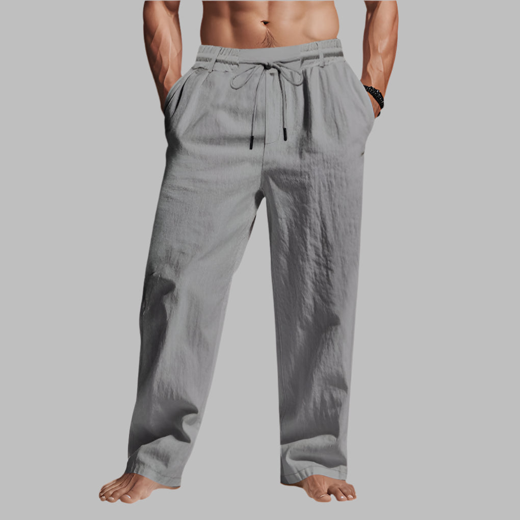 Breathable unisex linen drawstring trousers with a relaxed fit. Essential comfort pants for summer & casual wear.