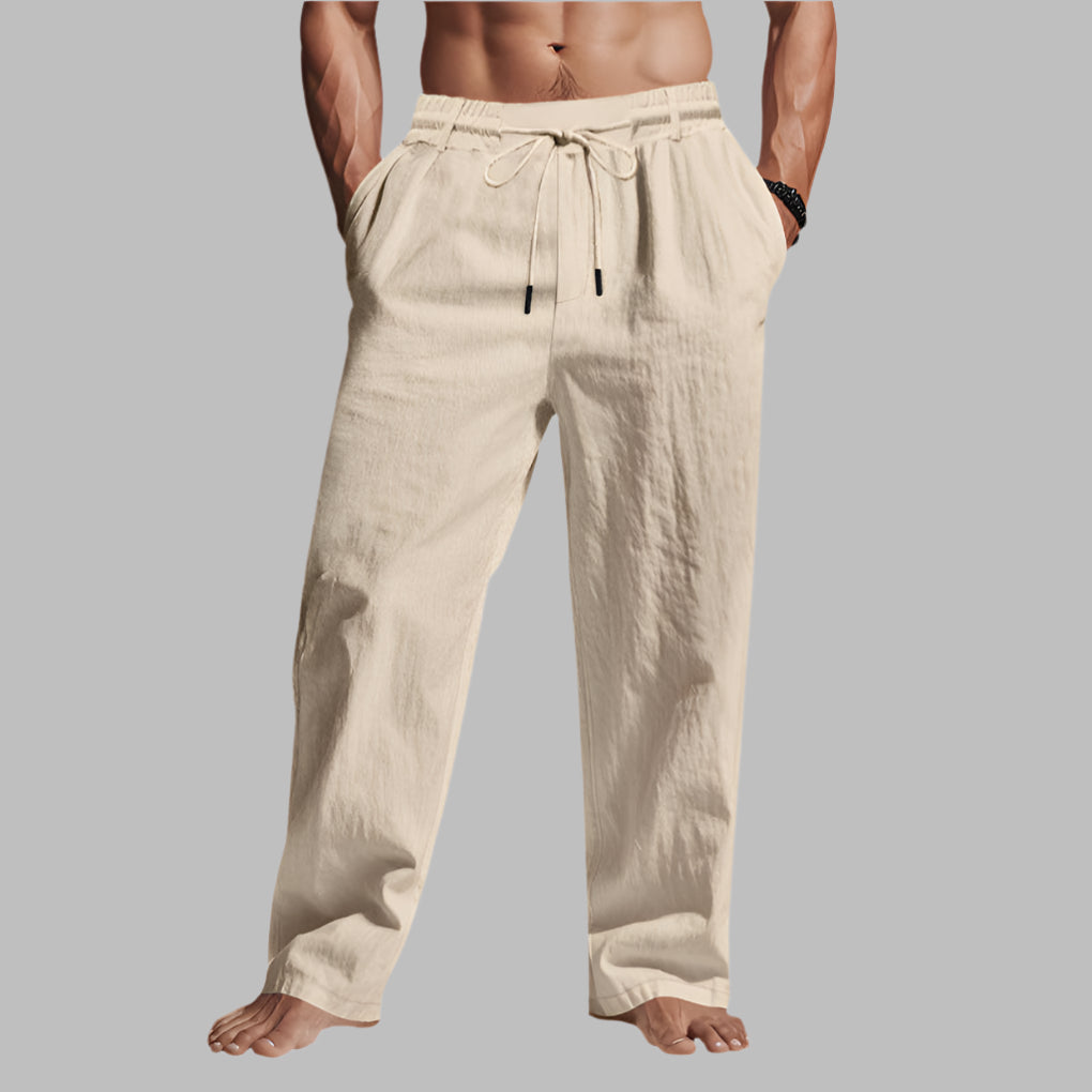 Lightweight, relaxed fit linen drawstring trousers. Unisex summer wear offering breathable comfort & casual style.