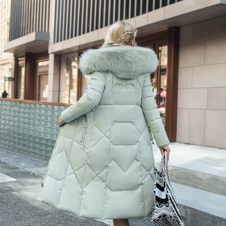 Close-up of the luxurious fluffy trim on the hood of a warm unisex long winter parka, emphasizing texture.